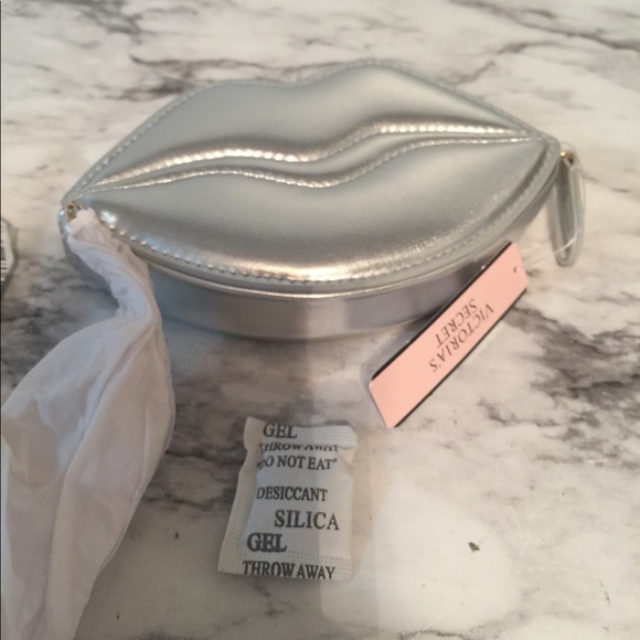 Victoria's Secret Handbags - Victoria Secret Metallic coin Lip style bag
